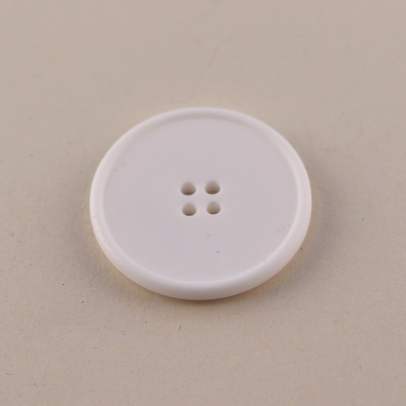 White haberdashery button