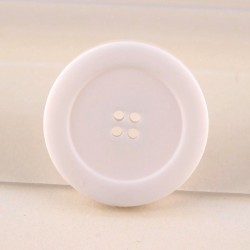 White haberdashery button