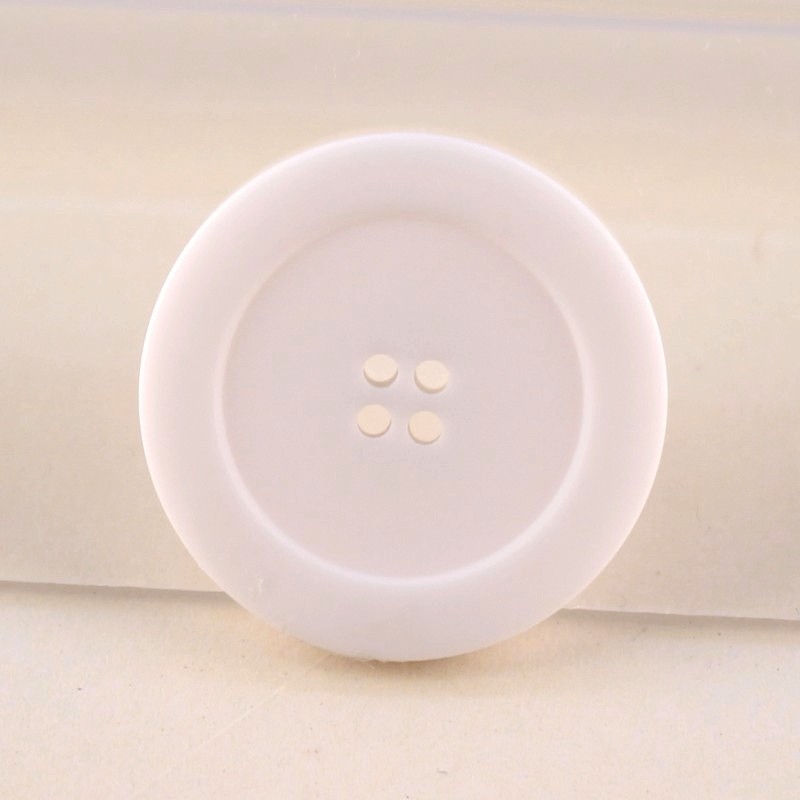 White haberdashery button White haberdashery button