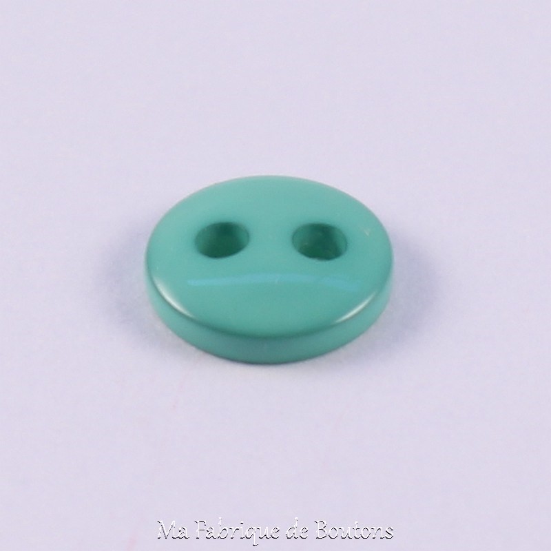 green sewing button