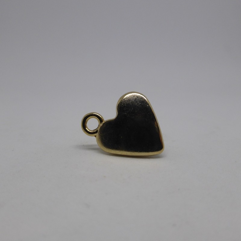 Golden heart shaped button Genèva Golden heart shaped button Genèva
