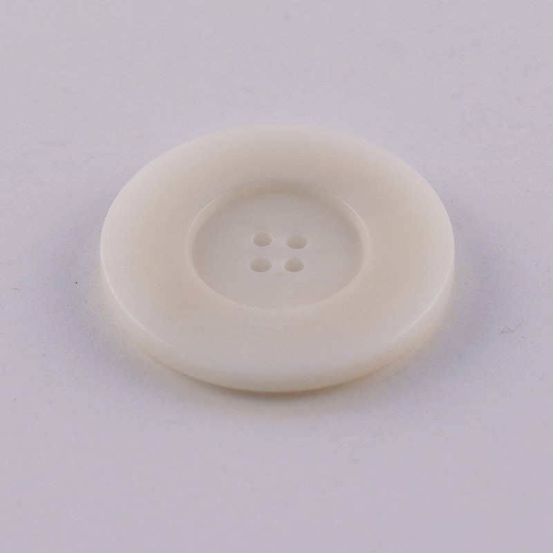Customised corozo button