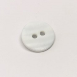 White mother-of-pearl button child drill