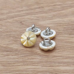 Mother of pearl sewing button with flower shape