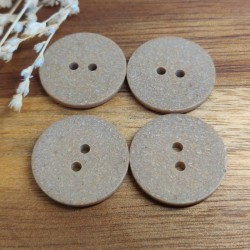 Recycled rice hull button