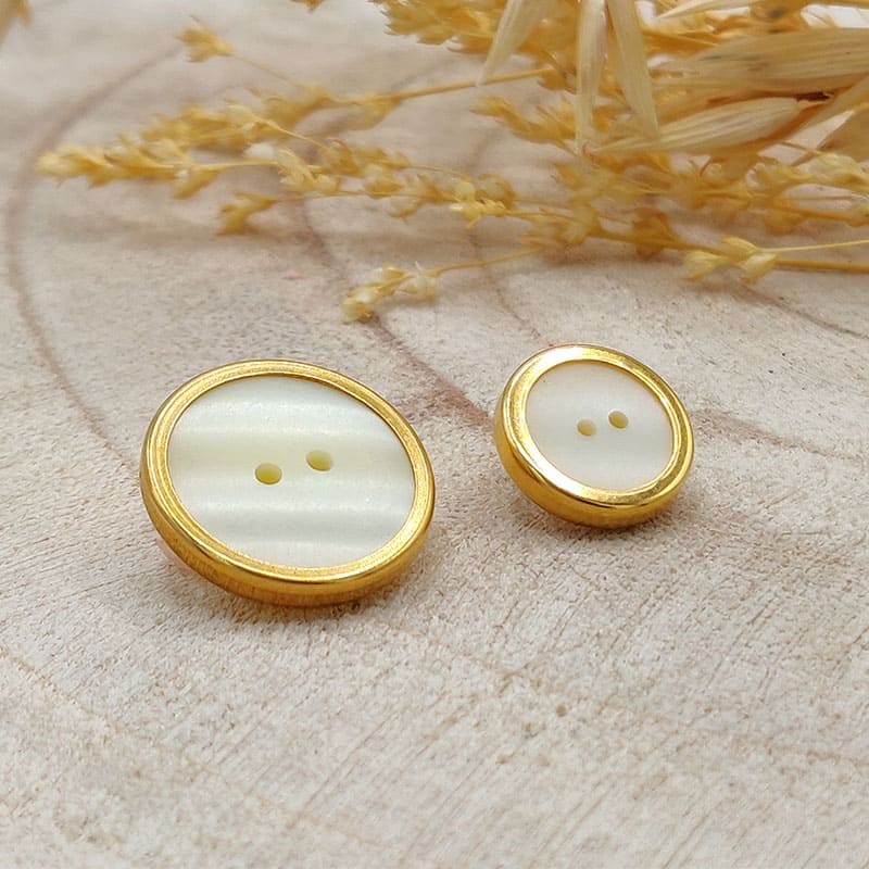 white and gold button