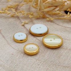 white and gold buttons