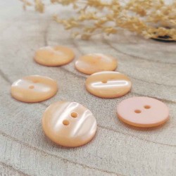 Set of pearl effect polyester buttons in peach colour