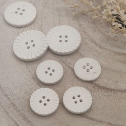 white synthetic button