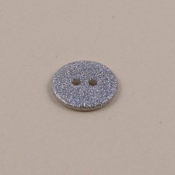 mother of pearl button with silver glitter